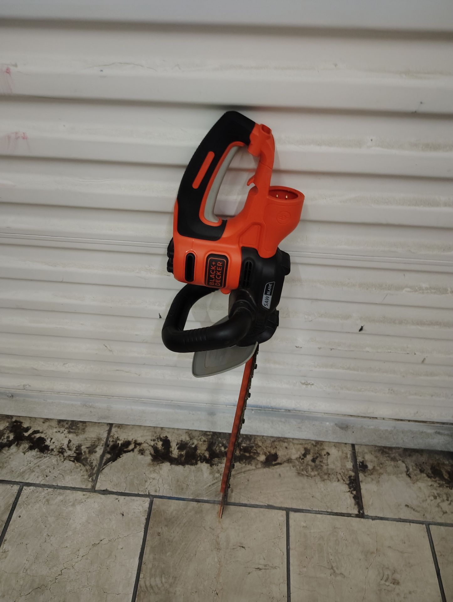 Black and Decker electric hedge trimmer used