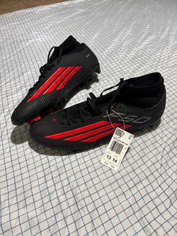 F50 Mid cut firm ground / multi ground soccer cleat