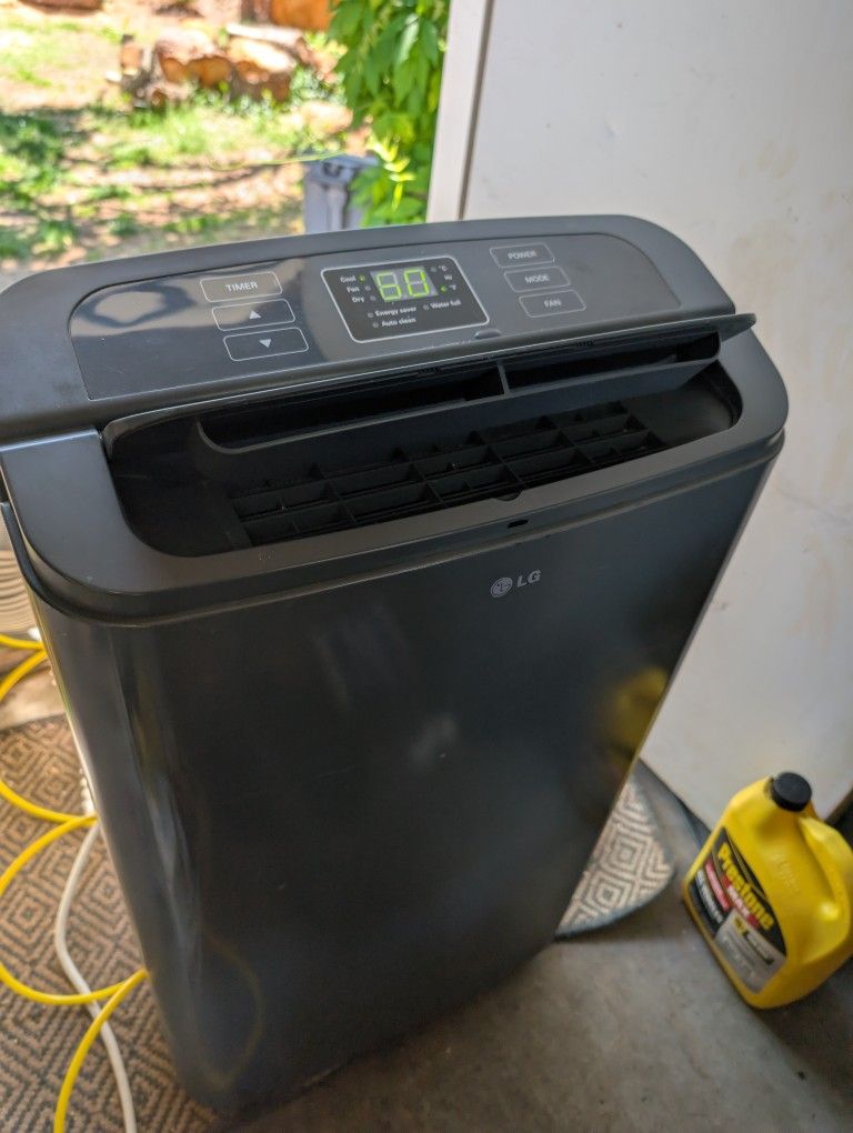 LG 12000 BTU AC Unit Air Conditioner And Dehumidifier