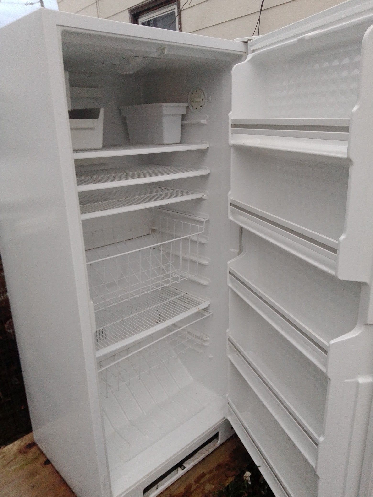 Stand up freezer with ice maker