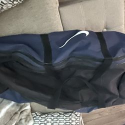 Bag Of used Softball Equipment, 3 Gloves, 3 Bats, 7 Softballs