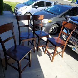 4 Brown Wood Chairs 