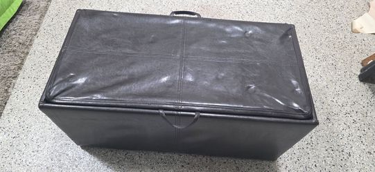 Free Black faux leather storage ottoman