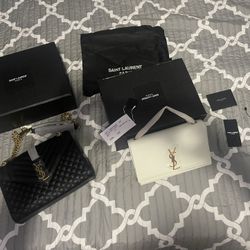 2 ysl purses 