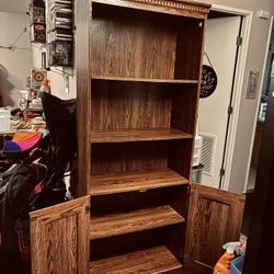 $$$145 (firm price)-one Beautiful tall book shelf  Not positive of which wood material its made (whether it's real wood or pressed wood? not sure?  bu