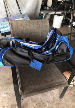 Black and blue travel rolling bag