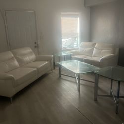 White Couch With Glass Table 
