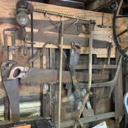 Antique saw collection and other items