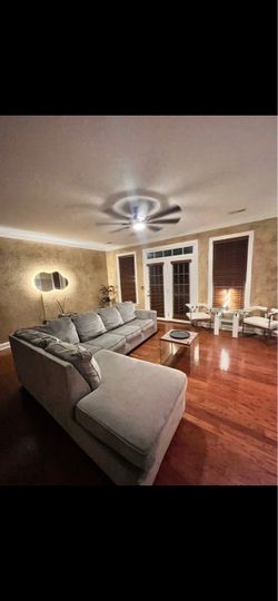 Ashley’s Gray Sectional Sofa