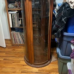 oak curio cabinet  with 3 glass shelves 