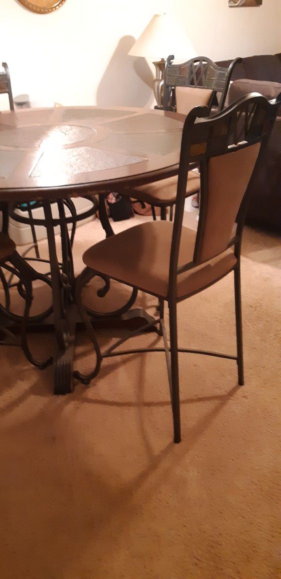 High top dining table with four chairs