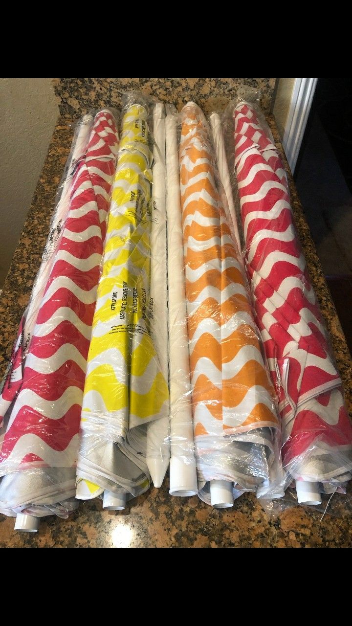 BRAND NEW BEACH UMBRELLAS 6 AND A HALF FEET TALL USE FOR BASEBALL GAMES SOCCER GAMES VOLLEYBALL GAMES AND MORE PRICED IS FIRM $30 EACH