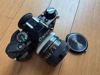 Canon AE-1 Program 35mm film camera and Canon FD 50mm SSC F1.4