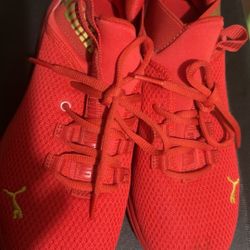 Red puma shoes