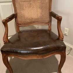 Pair of cane backed leather chair