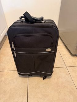 Small luggage, size 19 hight and 14 wide , first perso that brings $5 take it Costa Mesa