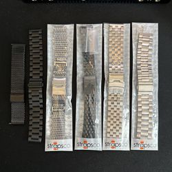 A Bunch Of Watch Bracelets