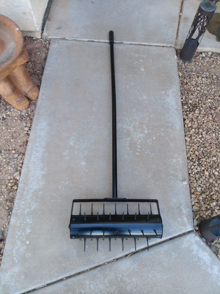 Rolling Lawn Aerator