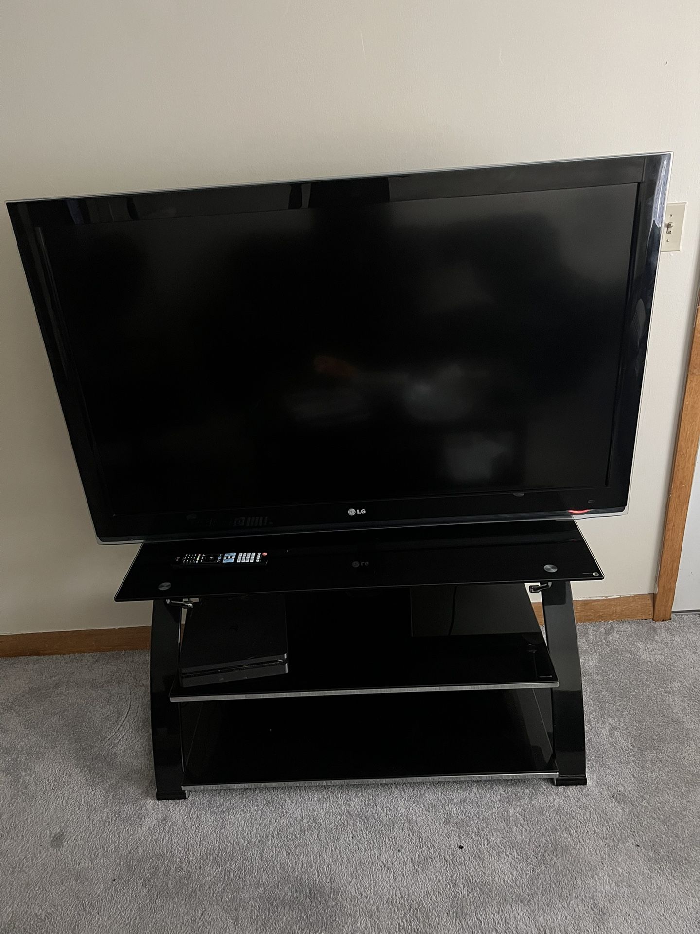 55 Inch TV With Glass Stand 