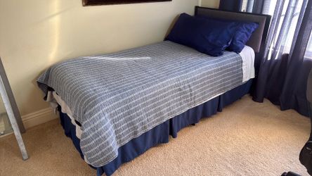 Twin XL bed (frame and mattress)
