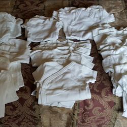 Bulk Onesies/Pants 50cents 0- 6 mns. Up75cents