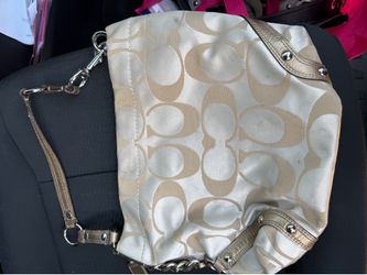 Beige vintage coach purse