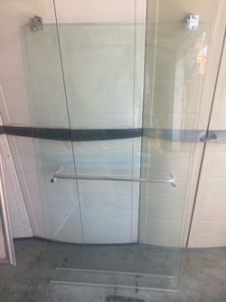 Bathroom tub sliding glass