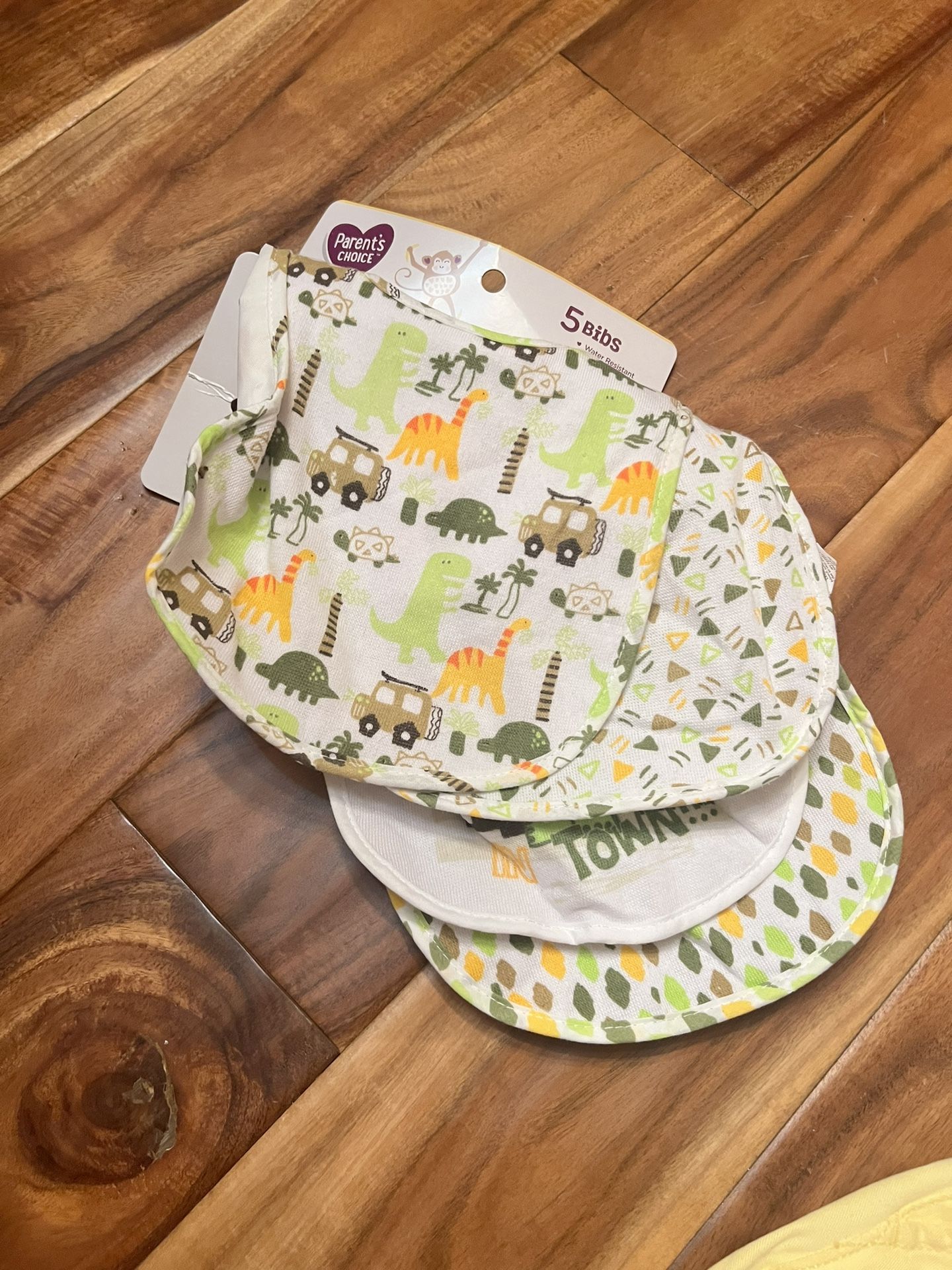 Parents choice baby boy print bibs. Includes 4. New