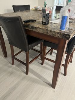 Used Square Granite Table, Four Chairs 