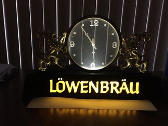 60 year old bar above register clock