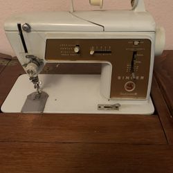 Singer Sewing Machine  And Cabinet.   