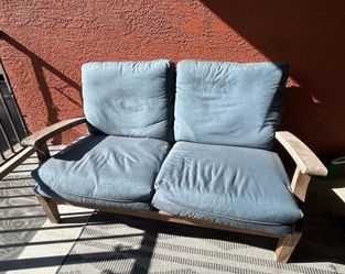 Outdoor teak loveseat