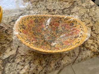3 yellow designing bowls