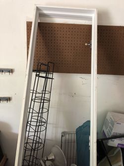 3 panel solid wood door white frame hangs and lock all together
