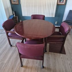 Round Table And 4 Wheeled Chairs
