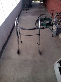 Walker - Foldable - Can Hold Up to 300 pounds.