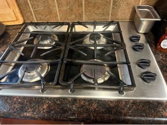 stainless steel GE stove top