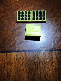 Coca Cola miniature bottles in rack 1992 (3 total)