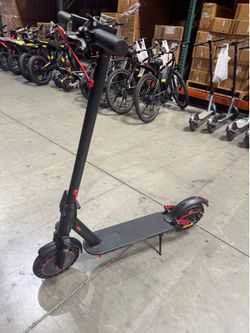 Front and rear shock-absorbing electric scooters