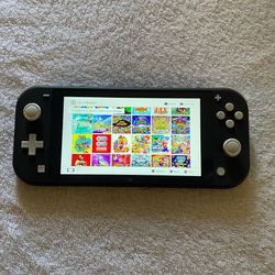 Nintendo Switch Lite With 100 Switch Games Included