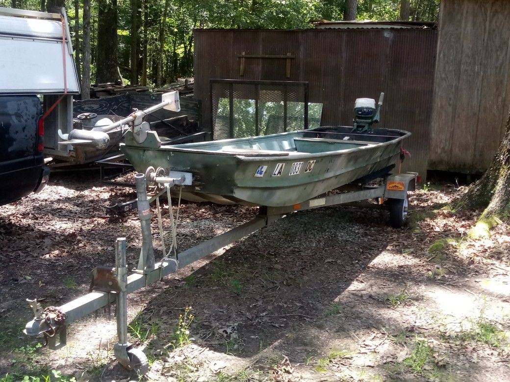 Photo 14 Foot Boat With Galvanized trailer And Vintage 6 Evinrude outboard motor