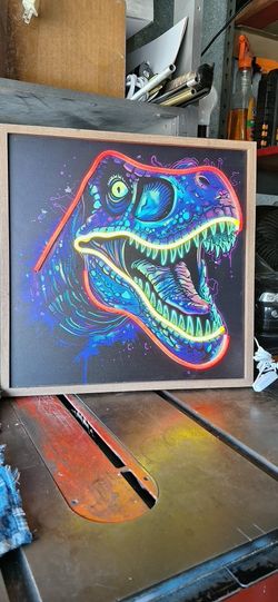 T- REX MULTICOLOURED DINOSAURD 16" X16" WIHT LED LIGKTS$ 20.00