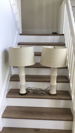 SET OF 2  CERAMIC CREAM COLOR LAMPS IN GREAT CONDITION 18 H X 4 W  $35.00