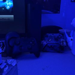 xbox series s 1tb with two controller and controller charging station