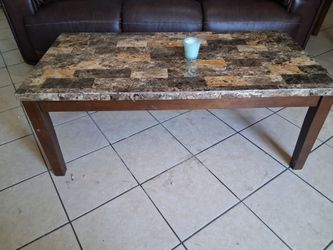 Really nice coffee table with two end tables at match