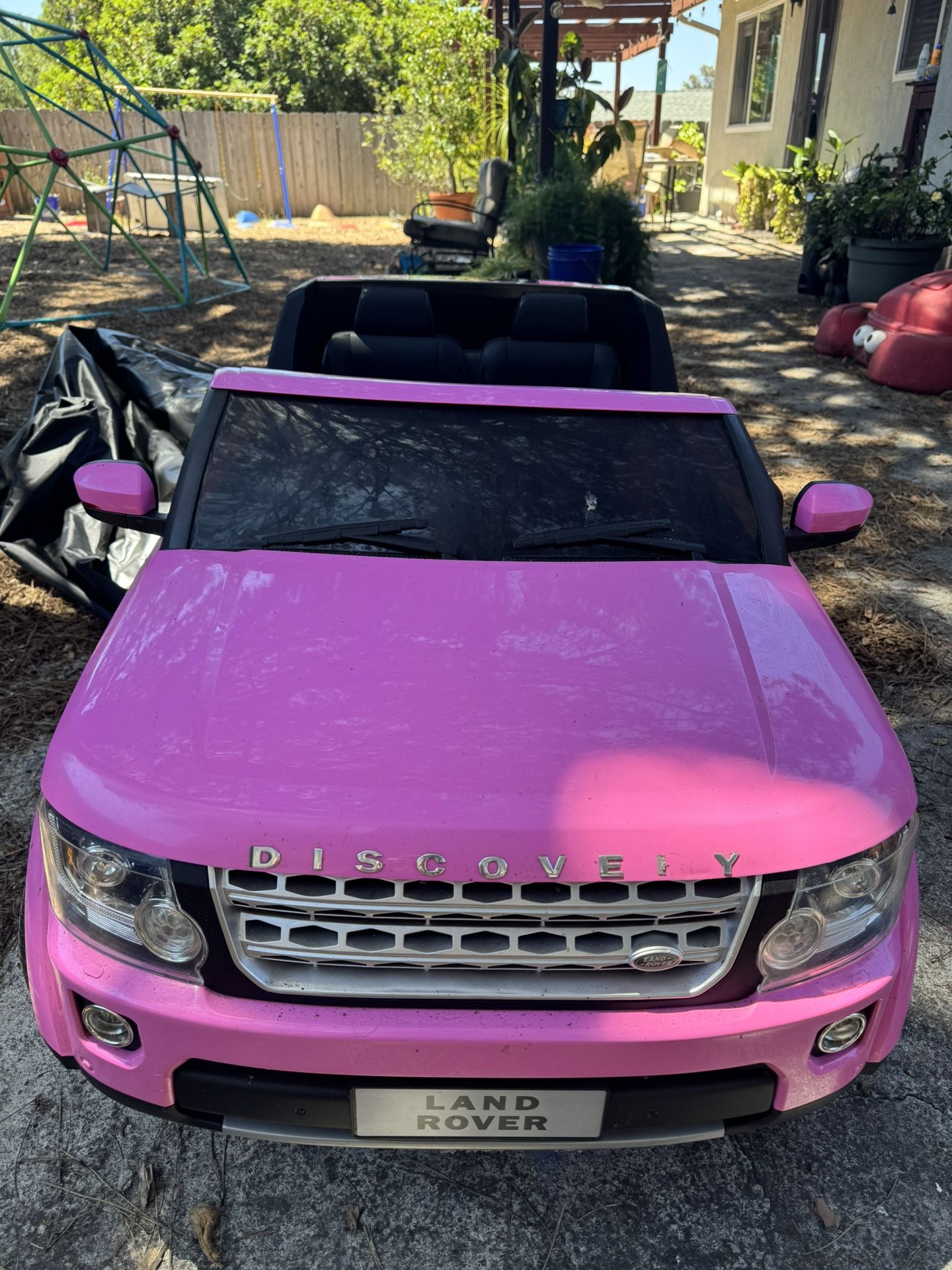 Pink Land Rover “power Wheels”
