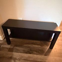 Dimension- 35.5 x 10 x 17.5
Versatile dark brown table with a bottom shelf. Good for TV stand, entryway, or just extra storage. Still solid.