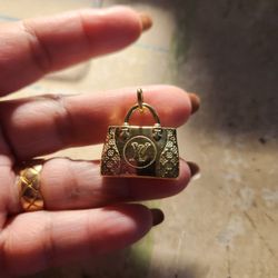 18k Gold LV Pendant  4.0 g .