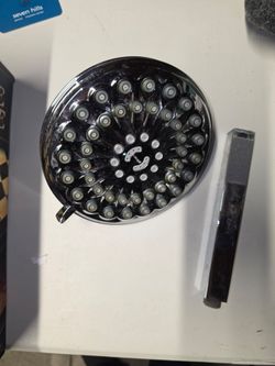 Shower head and handheld shower head
