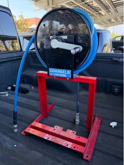 Coxreel with hose and bracket